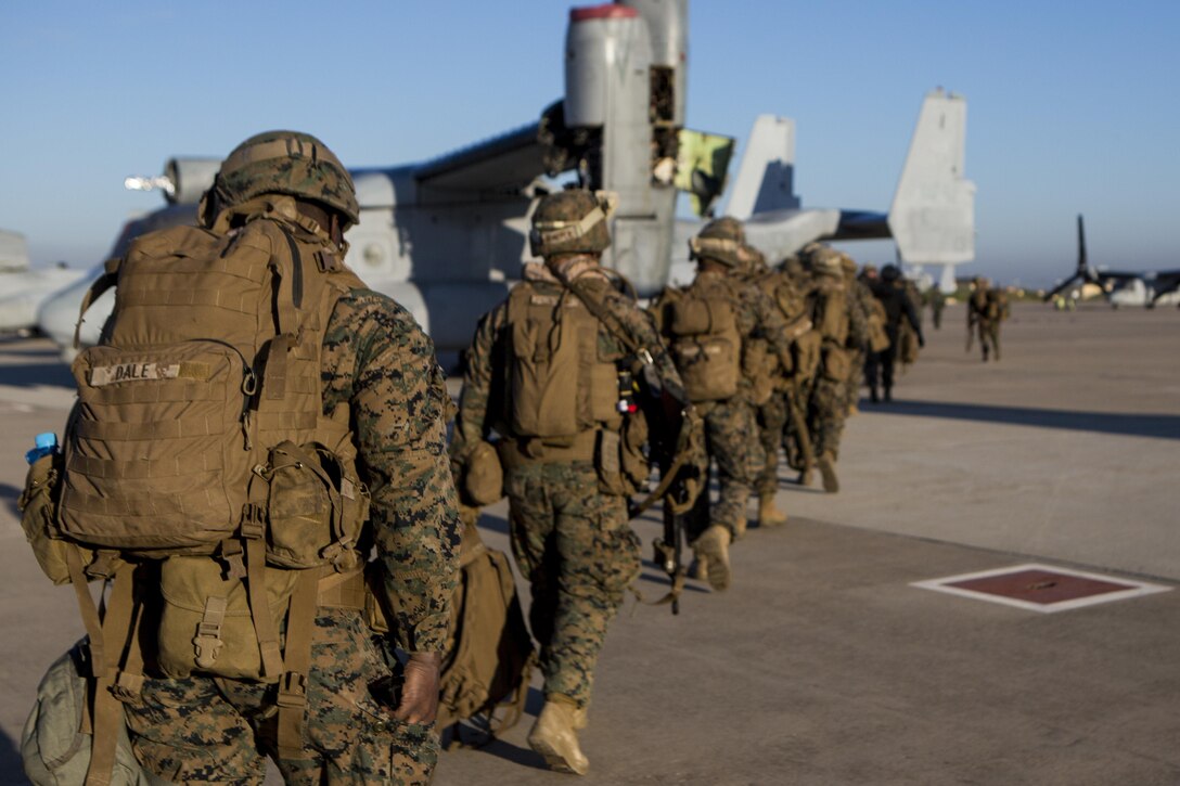 U.S. Marines with Special-Purpose Marine Air-Ground Task Force Crisis Response-Africa board an MV-22 Osprey during an alert force drill on Morón Air Base, Spain, Feb. 19, 2015. SPMAGTF-CR-AF maintains an alert status in order to respond to crises and regularly conducts unscripted events to test its ability to react at a moment’s notice. (U.S. Marine Corps photograph by Lance Cpl. Christopher Mendoza/Released)