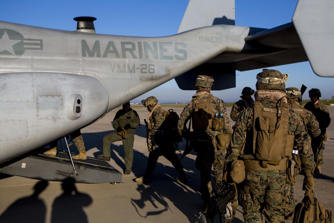 U.S. Marines with Special-Purpose Marine Air-Ground Task Force Crisis Response-Africa board an MV-22 Osprey during an alert force drill on Morón Air Base, Spain, Feb. 19, 2015. SPMAGTF-CR-AF maintains an alert status in order to respond to crises and regularly conducts unscripted events to test its ability to react at a moment’s notice. (U.S. Marine Corps photograph by Lance Cpl. Christopher Mendoza/Released)
