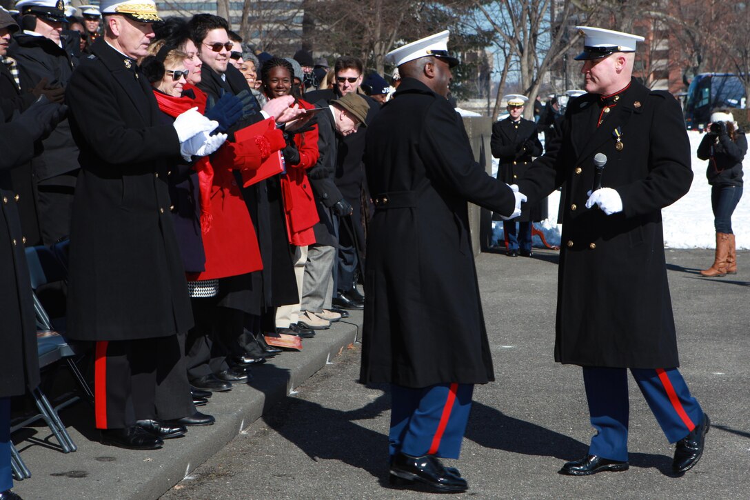 Gen. Joseph F. Dunford, the 36th Commandant of the Marine Corps hosts the Sergeant Major of the Marine Corps Relief and Appointment Ceremony at the Marine Corps War Memorial in Arlington, Va., Feb. 20, 2015. During the Ceremony Sgt. Maj. Micheal P. Barrett, the 17th Sergeant Major of the Marine Corps, retired and relinquished his post to Sgt. Maj. Ronald L. Green, the 18th Sergeant Major of the Marine Corps. (U.S. Marine Corps photo by Sgt. Marionne T. Mangrum.)