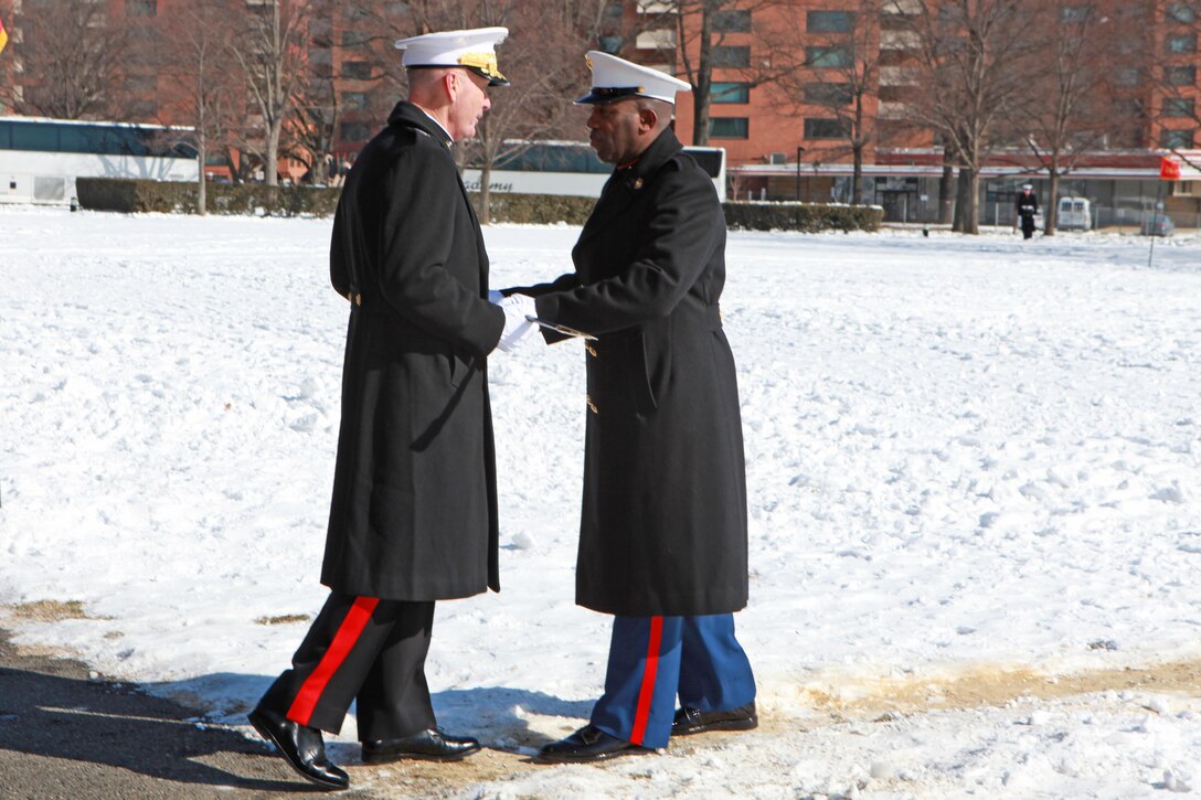 Gen. Joseph F. Dunford, the 36th Commandant of the Marine Corps hosts the Sergeant Major of the Marine Corps Relief and Appointment Ceremony at the Marine Corps War Memorial in Arlington, Va., Feb. 20, 2015. During the Ceremony Sgt. Maj. Micheal P. Barrett, the 17th Sergeant Major of the Marine Corps, retired and relinquished his post to Sgt. Maj. Ronald L. Green, the 18th Sergeant Major of the Marine Corps. (U.S. Marine Corps photo by Sgt. Marionne T. Mangrum.)