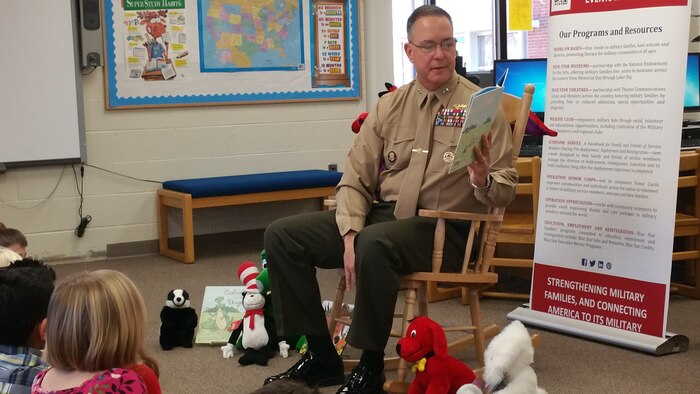 Maj. Gen. Andrew O’Donnell, deputy commanding general of Marine Corps Combat Development Command and father of Ashurst first grader Isabelle read “Cedric and the Dragon,” to all the first grade students at Ashurst Elementary school aboard Marine Corps Base Quantico. After O'Donnell read to the students Blue Star Families donated a book to each of the children in attendance.  