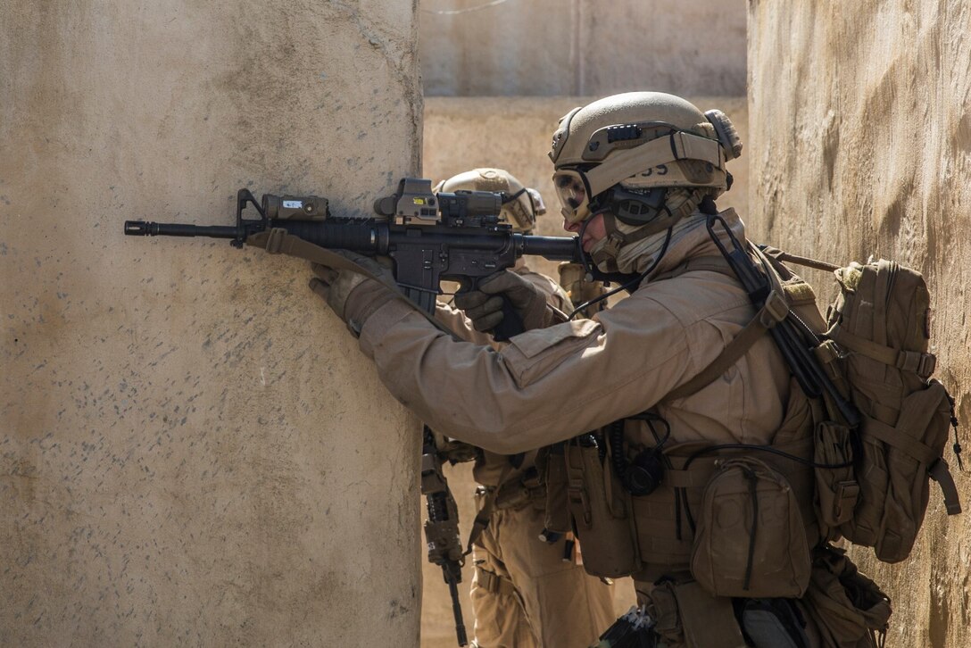 A U.S. Marine with the 15th Marine Expeditionary Unit’s Force Reconnaissance Detachment provides security during military operations in urban terrain training aboard Camp Pendleton, Calif., Feb. 19, 2015. These Marines are a part of the MEU’s Maritime Raid Force. The training provides the MEU with the opportunity to train for similar environments in preparation for their upcoming deployment. (U.S. Marine Corps photo by Sgt. Emmanuel Ramos/Released)