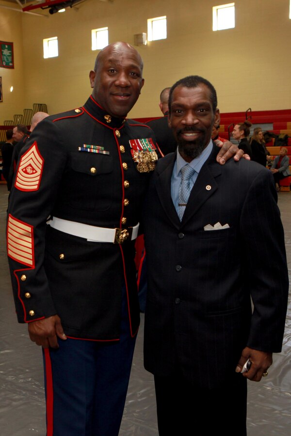 A reception for the Sergeant Major of the Marine Corps Relief and Appointment Ceremony is held at the Cpl. Terry L. Smith Gym on Joint Base Myer-Henderson Hall, Va., Feb. 20, 2015. During the Ceremony Sgt. Maj. Micheal P. Barrett, the 17th Sergeant Major of the Marine Corps, retired and relinquished his post to Sgt. Maj. Ronald L. Green, the 18th Sergeant Major of the Marine Corps. (U.S. Marine Corps photo by Sgt. Marionne T. Mangrum)