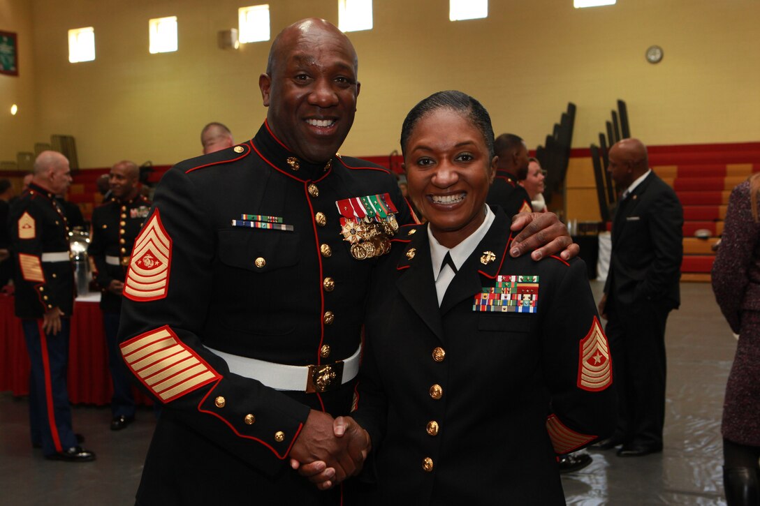 A reception for the Sergeant Major of the Marine Corps Relief and Appointment Ceremony is held at the Cpl. Terry L. Smith Gym on Joint Base Myer-Henderson Hall, Va., Feb. 20, 2015. During the Ceremony Sgt. Maj. Micheal P. Barrett, the 17th Sergeant Major of the Marine Corps, retired and relinquished his post to Sgt. Maj. Ronald L. Green, the 18th Sergeant Major of the Marine Corps. (U.S. Marine Corps photo by Sgt. Marionne T. Mangrum)