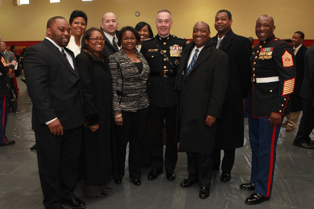 A reception for the Sergeant Major of the Marine Corps Relief and Appointment Ceremony is held at the Cpl. Terry L. Smith Gym on Joint Base Myer-Henderson Hall, Va., Feb. 20, 2015. During the Ceremony Sgt. Maj. Micheal P. Barrett, the 17th Sergeant Major of the Marine Corps, retired and relinquished his post to Sgt. Maj. Ronald L. Green, the 18th Sergeant Major of the Marine Corps. (U.S. Marine Corps photo by Sgt. Marionne T. Mangrum.)