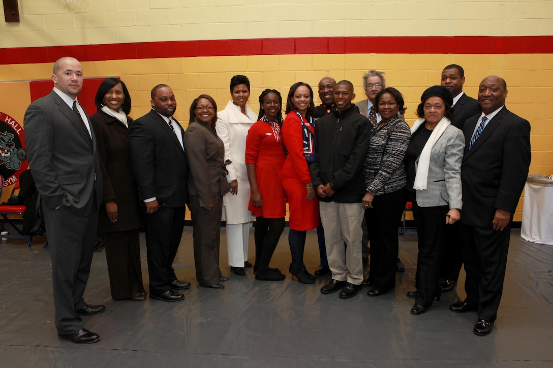 A reception for the Sergeant Major of the Marine Corps Relief and Appointment Ceremony is held at the Cpl. Terry L. Smith Gym on Joint Base Myer-Henderson Hall, Va., Feb. 20, 2015. During the Ceremony Sgt. Maj. Micheal P. Barrett, the 17th Sergeant Major of the Marine Corps, retired and relinquished his post to Sgt. Maj. Ronald L. Green, the 18th Sergeant Major of the Marine Corps. (U.S. Marine Corps photo by Sgt. Marionne T. Mangrum.)