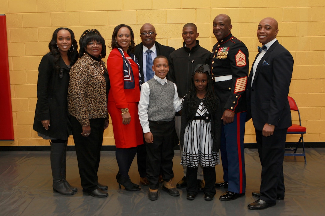 A reception for the Sergeant Major of the Marine Corps Relief and Appointment Ceremony is held at the Cpl. Terry L. Smith Gym on Joint Base Myer-Henderson Hall, Va., Feb. 20, 2015. During the Ceremony Sgt. Maj. Micheal P. Barrett, the 17th Sergeant Major of the Marine Corps, retired and relinquished his post to Sgt. Maj. Ronald L. Green, the 18th Sergeant Major of the Marine Corps. (U.S. Marine Corps photo by Sgt. Marionne T. Mangrum.)