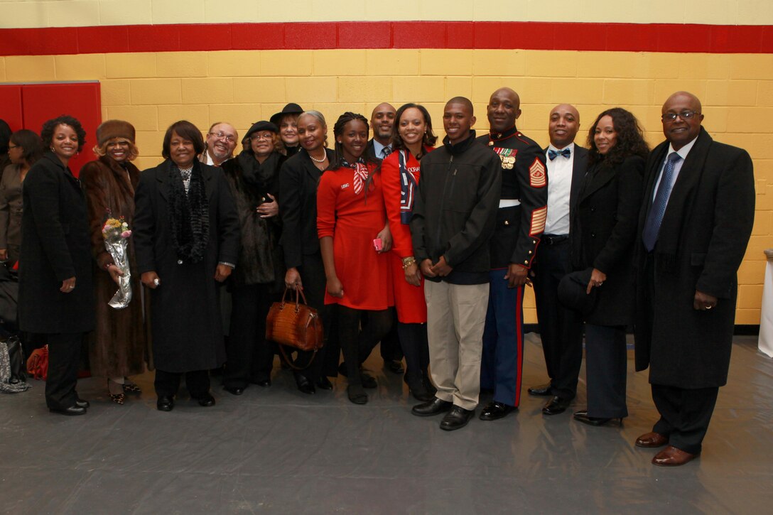A reception for the Sergeant Major of the Marine Corps Relief and Appointment Ceremony is held at the Cpl. Terry L. Smith Gym on Joint Base Myer-Henderson Hall, Va., Feb. 20, 2015. During the Ceremony Sgt. Maj. Micheal P. Barrett, the 17th Sergeant Major of the Marine Corps, retired and relinquished his post to Sgt. Maj. Ronald L. Green, the 18th Sergeant Major of the Marine Corps. (U.S. Marine Corps photo by Sgt. Marionne T. Mangrum.)