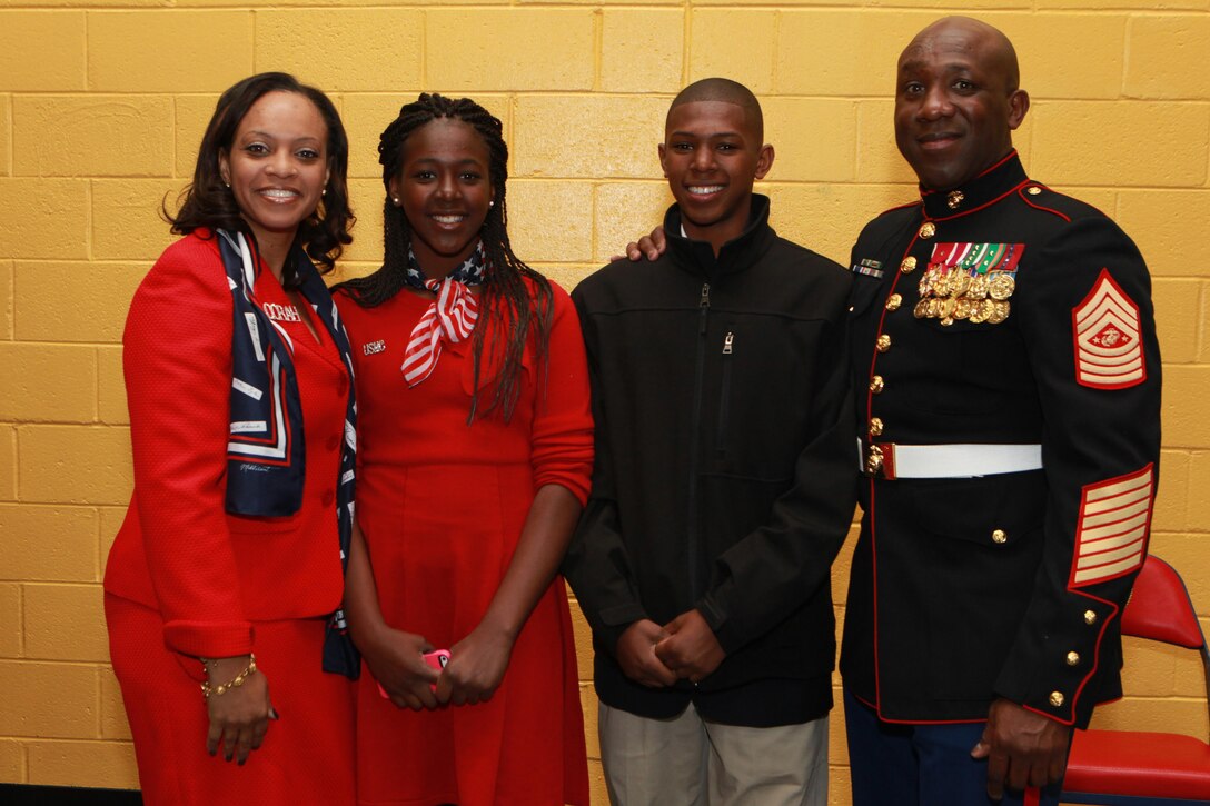 A reception for the Sergeant Major of the Marine Corps Relief and Appointment Ceremony is held at the Cpl. Terry L. Smith Gym on Joint Base Myer-Henderson Hall, Va., Feb. 20, 2015. During the Ceremony Sgt. Maj. Micheal P. Barrett, the 17th Sergeant Major of the Marine Corps, retired and relinquished his post to Sgt. Maj. Ronald L. Green, the 18th Sergeant Major of the Marine Corps. (U.S. Marine Corps photo by Sgt. Marionne T. Mangrum.)