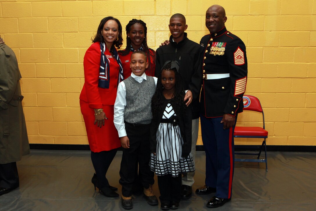 A reception for the Sergeant Major of the Marine Corps Relief and Appointment Ceremony is held at the Cpl. Terry L. Smith Gym on Joint Base Myer-Henderson Hall, Va., Feb. 20, 2015. During the Ceremony Sgt. Maj. Micheal P. Barrett, the 17th Sergeant Major of the Marine Corps, retired and relinquished his post to Sgt. Maj. Ronald L. Green, the 18th Sergeant Major of the Marine Corps. (U.S. Marine Corps photo by Sgt. Marionne T. Mangrum.)