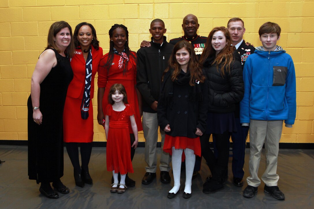 A reception for the Sergeant Major of the Marine Corps Relief and Appointment Ceremony is held at the Cpl. Terry L. Smith Gym on Joint Base Myer-Henderson Hall, Va., Feb. 20, 2015. During the Ceremony Sgt. Maj. Micheal P. Barrett, the 17th Sergeant Major of the Marine Corps, retired and relinquished his post to Sgt. Maj. Ronald L. Green, the 18th Sergeant Major of the Marine Corps. (U.S. Marine Corps photo by Sgt. Marionne T. Mangrum.)