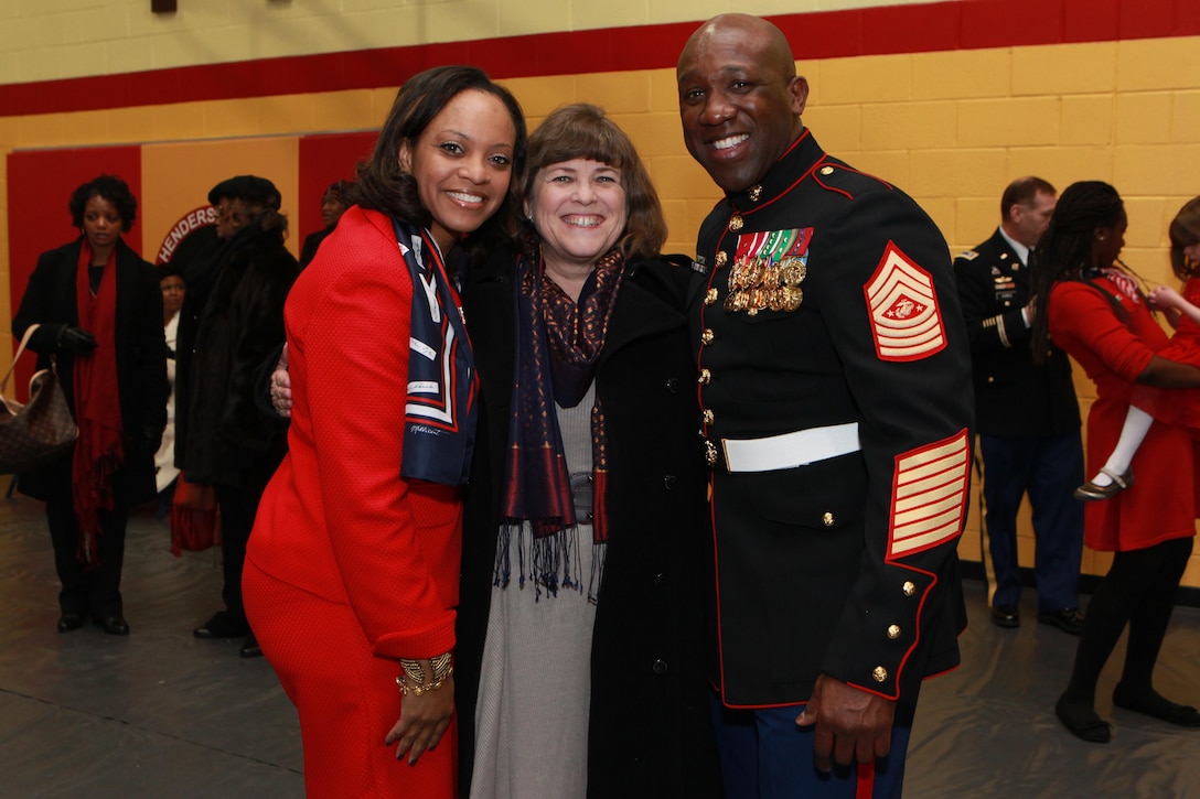 A reception for the Sergeant Major of the Marine Corps Relief and Appointment Ceremony is held at the Cpl. Terry L. Smith Gym on Joint Base Myer-Henderson Hall, Va., Feb. 20, 2015. During the Ceremony Sgt. Maj. Micheal P. Barrett, the 17th Sergeant Major of the Marine Corps, retired and relinquished his post to Sgt. Maj. Ronald L. Green, the 18th Sergeant Major of the Marine Corps. (U.S. Marine Corps photo by Sgt. Marionne T. Mangrum.)