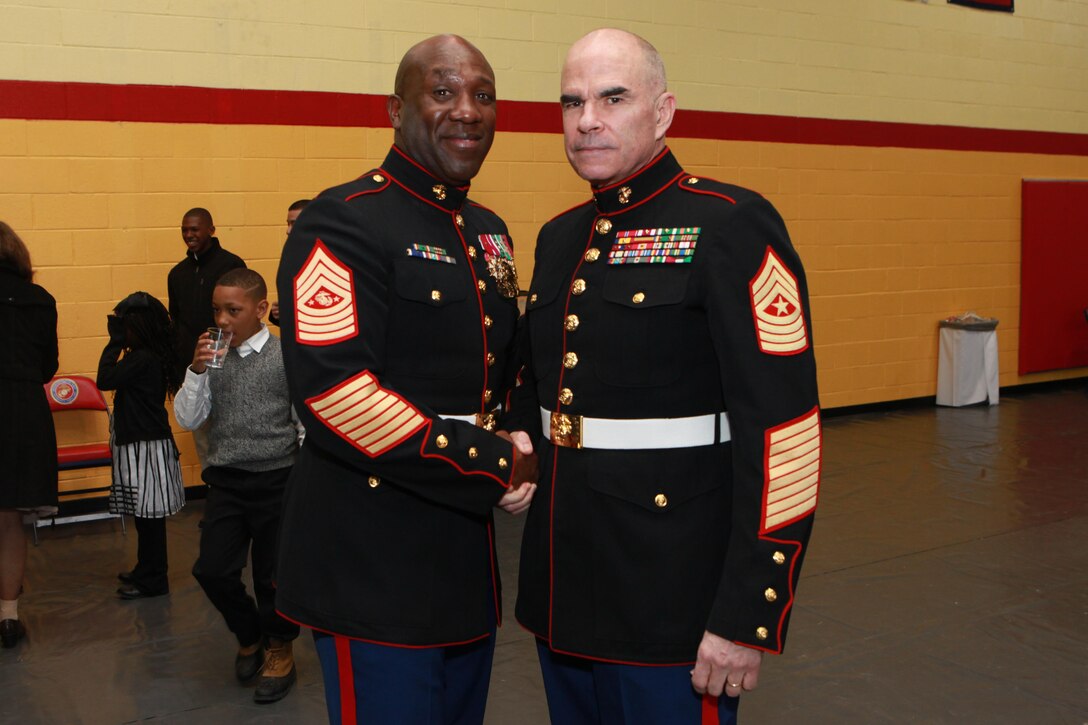 A reception for the Sergeant Major of the Marine Corps Relief and Appointment Ceremony is held at the Cpl. Terry L. Smith Gym on Joint Base Myer-Henderson Hall, Va., Feb. 20, 2015. During the Ceremony Sgt. Maj. Micheal P. Barrett, the 17th Sergeant Major of the Marine Corps, retired and relinquished his post to Sgt. Maj. Ronald L. Green, the 18th Sergeant Major of the Marine Corps. (U.S. Marine Corps photo by Sgt. Marionne T. Mangrum.)