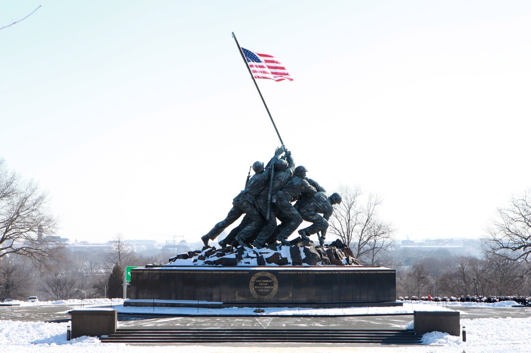 Gen. Joseph F. Dunford, the 36th Commandant of the Marine Corps hosts the Sergeant Major of the Marine Corps Relief and Appointment Ceremony at the Marine Corps War Memorial in Arlington, Va., Feb. 20, 2015. During the Ceremony Sgt. Maj. Micheal P. Barrett, the 17th Sergeant Major of the Marine Corps, retired and relinquished his post to Sgt. Maj. Ronald L. Green, the 18th Sergeant Major of the Marine Corps. (U.S. Marine Corps photo by Sgt. Marionne T. Mangrum.)