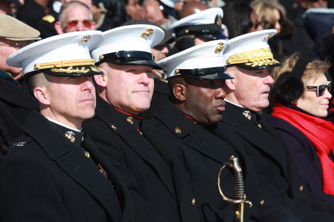 Gen. Joseph F. Dunford, the 36th Commandant of the Marine Corps hosts the Sergeant Major of the Marine Corps Relief and Appointment Ceremony at the Marine Corps War Memorial in Arlington, Va., Feb. 20, 2015. During the Ceremony Sgt. Maj. Micheal P. Barrett, the 17th Sergeant Major of the Marine Corps, retired and relinquished his post to Sgt. Maj. Ronald L. Green, the 18th Sergeant Major of the Marine Corps. (U.S. Marine Corps photo by Sgt. Marionne T. Mangrum.)