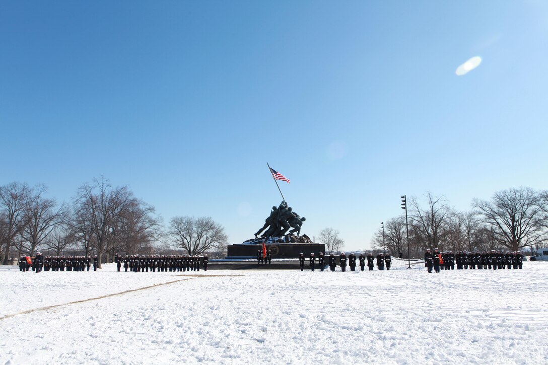 Gen. Joseph F. Dunford, the 36th Commandant of the Marine Corps hosts the Sergeant Major of the Marine Corps Relief and Appointment Ceremony at the Marine Corps War Memorial in Arlington, Va., Feb. 20, 2015. During the Ceremony Sgt. Maj. Micheal P. Barrett, the 17th Sergeant Major of the Marine Corps, retired and relinquished his post to Sgt. Maj. Ronald L. Green, the 18th Sergeant Major of the Marine Corps. (U.S. Marine Corps photo by Sgt. Marionne T. Mangrum.)