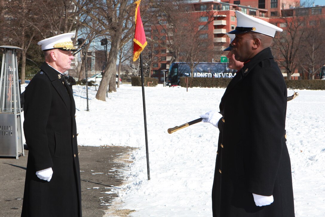 Gen. Joseph F. Dunford, the 36th Commandant of the Marine Corps hosts the Sergeant Major of the Marine Corps Relief and Appointment Ceremony at the Marine Corps War Memorial in Arlington, Va., Feb. 20, 2015. During the Ceremony Sgt. Maj. Micheal P. Barrett, the 17th Sergeant Major of the Marine Corps, retired and relinquished his post to Sgt. Maj. Ronald L. Green, the 18th Sergeant Major of the Marine Corps. (U.S. Marine Corps photo by Sgt. Marionne T. Mangrum.)