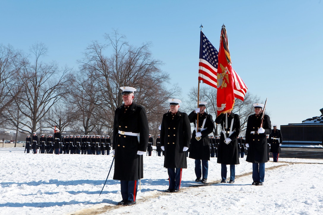 Gen. Joseph F. Dunford, the 36th Commandant of the Marine Corps hosts the Sergeant Major of the Marine Corps Relief and Appointment Ceremony at the Marine Corps War Memorial in Arlington, Va., Feb. 20, 2015. During the Ceremony Sgt. Maj. Micheal P. Barrett, the 17th Sergeant Major of the Marine Corps, retired and relinquished his post to Sgt. Maj. Ronald L. Green, the 18th Sergeant Major of the Marine Corps. (U.S. Marine Corps photo by Sgt. Marionne T. Mangrum.)
