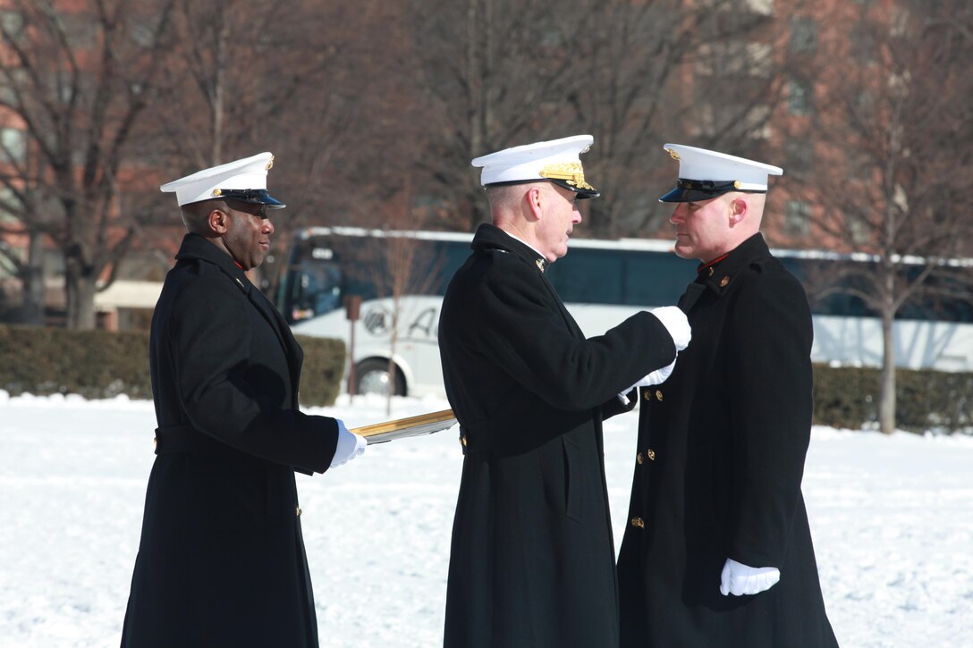 Gen. Joseph F. Dunford, the 36th Commandant of the Marine Corps hosts the Sergeant Major of the Marine Corps Relief and Appointment Ceremony at the Marine Corps War Memorial in Arlington, Va., Feb. 20, 2015. During the Ceremony Sgt. Maj. Micheal P. Barrett, the 17th Sergeant Major of the Marine Corps, retired and relinquished his post to Sgt. Maj. Ronald L. Green, the 18th Sergeant Major of the Marine Corps. (U.S. Marine Corps photo by Sgt. Marionne T. Mangrum.)