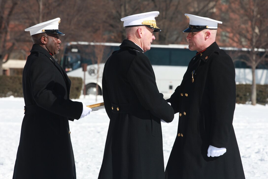 Gen. Joseph F. Dunford, the 36th Commandant of the Marine Corps hosts the Sergeant Major of the Marine Corps Relief and Appointment Ceremony at the Marine Corps War Memorial in Arlington, Va., Feb. 20, 2015. During the Ceremony Sgt. Maj. Micheal P. Barrett, the 17th Sergeant Major of the Marine Corps, retired and relinquished his post to Sgt. Maj. Ronald L. Green, the 18th Sergeant Major of the Marine Corps. (U.S. Marine Corps photo by Sgt. Marionne T. Mangrum)