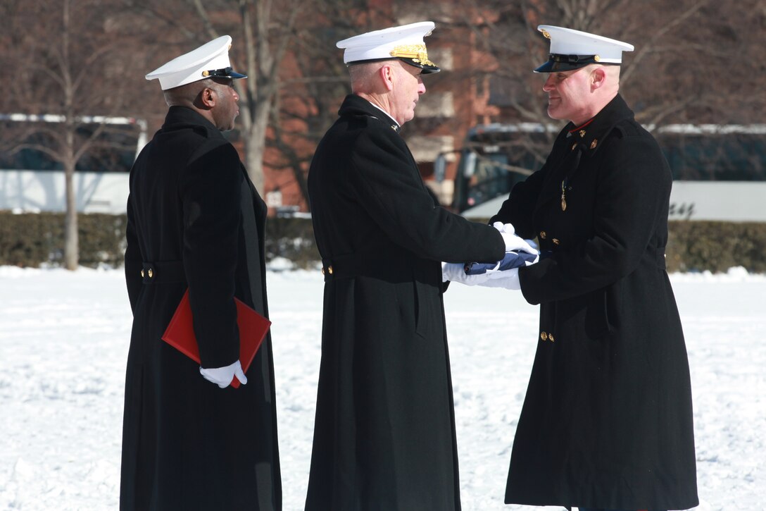 Gen. Joseph F. Dunford, the 36th Commandant of the Marine Corps hosts the Sergeant Major of the Marine Corps Relief and Appointment Ceremony at the Marine Corps War Memorial in Arlington, Va., Feb. 20, 2015. During the Ceremony Sgt. Maj. Micheal P. Barrett, the 17th Sergeant Major of the Marine Corps, retired and relinquished his post to Sgt. Maj. Ronald L. Green, the 18th Sergeant Major of the Marine Corps. (U.S. Marine Corps photo by Sgt. Marionne T. Mangrum.)