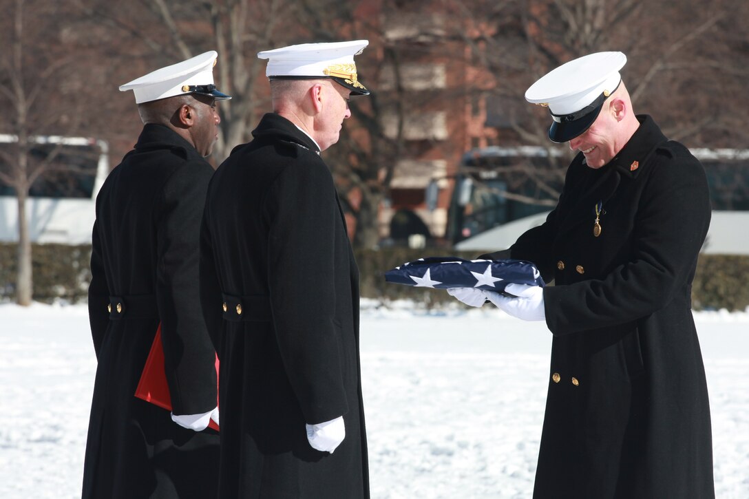 Gen. Joseph F. Dunford, the 36th Commandant of the Marine Corps hosts the Sergeant Major of the Marine Corps Relief and Appointment Ceremony at the Marine Corps War Memorial in Arlington, Va., Feb. 20, 2015. During the Ceremony Sgt. Maj. Micheal P. Barrett, the 17th Sergeant Major of the Marine Corps, retired and relinquished his post to Sgt. Maj. Ronald L. Green, the 18th Sergeant Major of the Marine Corps. (U.S. Marine Corps photo by Sgt. Marionne T. Mangrum.)
