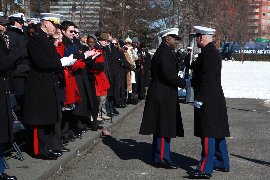 Gen. Joseph F. Dunford, the 36th Commandant of the Marine Corps hosts the Sergeant Major of the Marine Corps Relief and Appointment Ceremony at the Marine Corps War Memorial in Arlington, Va., Feb. 20, 2015. During the Ceremony Sgt. Maj. Micheal P. Barrett, the 17th Sergeant Major of the Marine Corps, retired and relinquished his post to Sgt. Maj. Ronald L. Green, the 18th Sergeant Major of the Marine Corps. (U.S. Marine Corps photo by Sgt. Marionne T. Mangrum.)