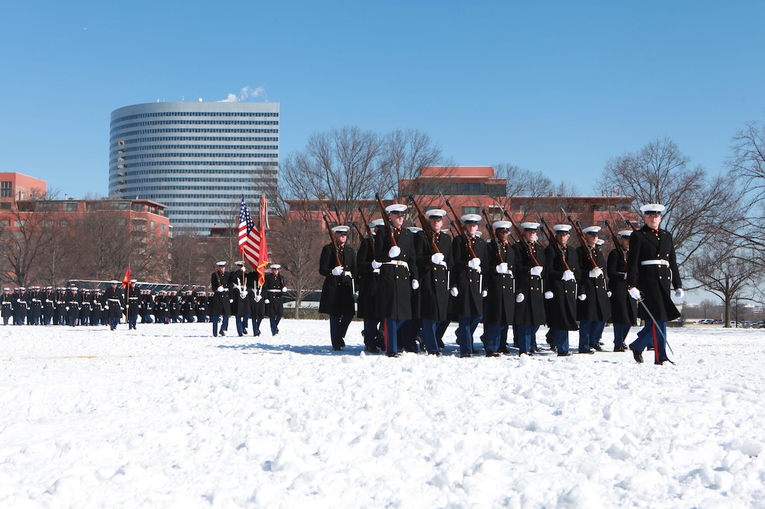 Gen. Joseph F. Dunford, the 36th Commandant of the Marine Corps hosts the Sergeant Major of the Marine Corps Relief and Appointment Ceremony at the Marine Corps War Memorial in Arlington, Va., Feb. 20, 2015. During the Ceremony Sgt. Maj. Micheal P. Barrett, the 17th Sergeant Major of the Marine Corps, retired and relinquished his post to Sgt. Maj. Ronald L. Green, the 18th Sergeant Major of the Marine Corps. (U.S. Marine Corps photo by Sgt. Marionne T. Mangrum.)