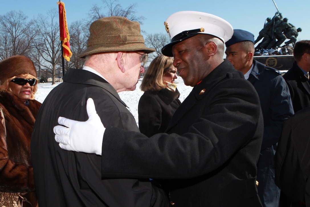 Gen. Joseph F. Dunford, the 36th Commandant of the Marine Corps hosts the Sergeant Major of the Marine Corps Relief and Appointment Ceremony at the Marine Corps War Memorial in Arlington, Va., Feb. 20, 2015. During the Ceremony Sgt. Maj. Micheal P. Barrett, the 17th Sergeant Major of the Marine Corps, retired and relinquished his post to Sgt. Maj. Ronald L. Green, the 18th Sergeant Major of the Marine Corps. (U.S. Marine Corps photo by Sgt. Marionne T. Mangrum.)