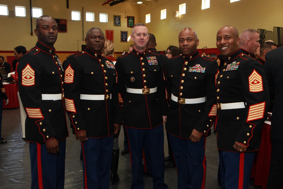 A reception for the Sergeant Major of the Marine Corps Relief and Appointment Ceremony is held at the Cpl. Terry L. Smith Gym on Joint Base Myer-Henderson Hall, Va., Feb. 20, 2015. During the Ceremony Sgt. Maj. Micheal P. Barrett, the 17th Sergeant Major of the Marine Corps, retired and relinquished his post to Sgt. Maj. Ronald L. Green, the 18th Sergeant Major of the Marine Corps. (U.S. Marine Corps photo by Sgt. Marionne T. Mangrum.)