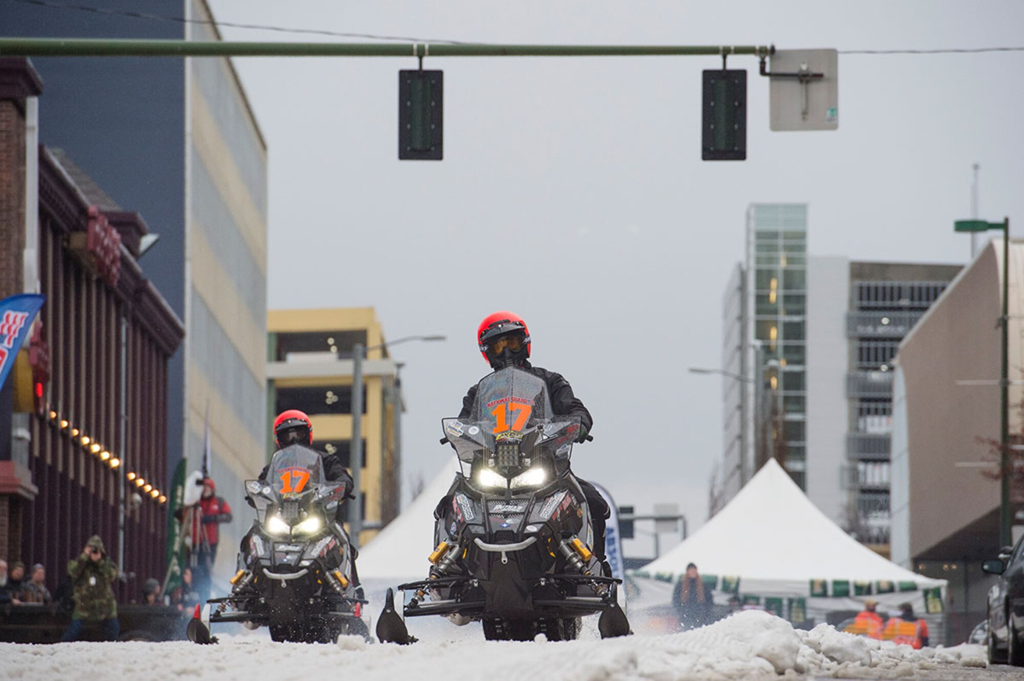 Iron Dog racers start the 2,000 mile-long course in Anchorage, Alaska, Feb. 21, 2015. For the first time, this year's race course passes through Joint Base Elmendorf-Richardson. (U.S. Air Force photo/Alejandro Pena)