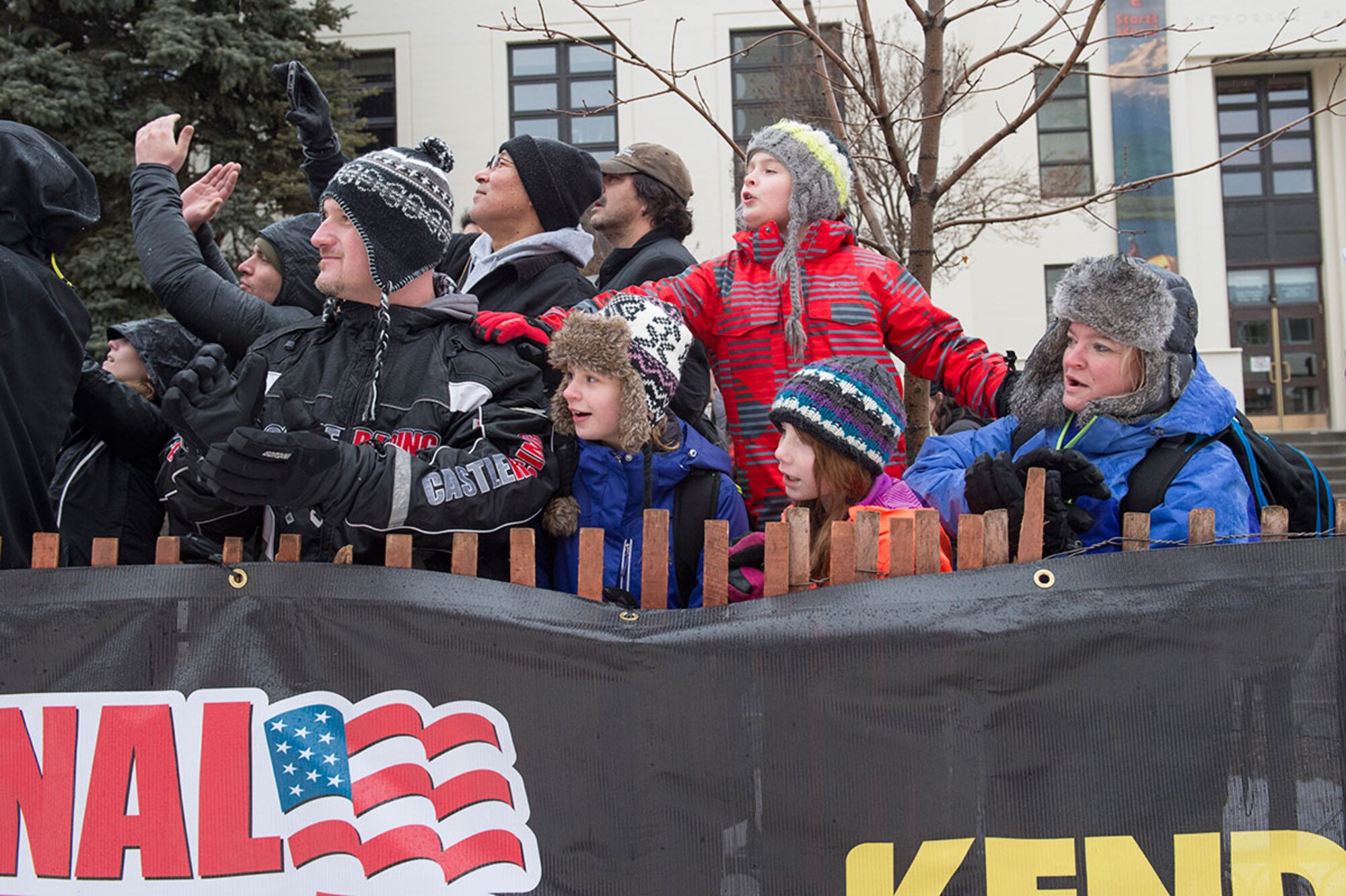 Spectators watch Iron Dog racers start the 2,000 mile-long course in Anchorage, Alaska, Feb. 21, 2015. For the first time, this year's race course passed through Joint Base Elmendorf-Richardson. (U.S. Air Force photo/Alejandro Pena)