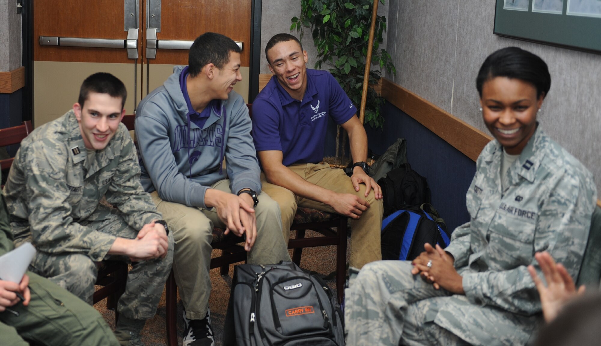Capt. Aisha Lockett, right, speaks with Kansas State University ROTC cadets about the force support career field, Feb., 19 at Kansas State University in Manhattan, Kan. The force support career field was one of the 12 Air Force specialty codes represented at Career Day. (U.S. Air Force photo by 2nd Lt. Krystal Jimenez)