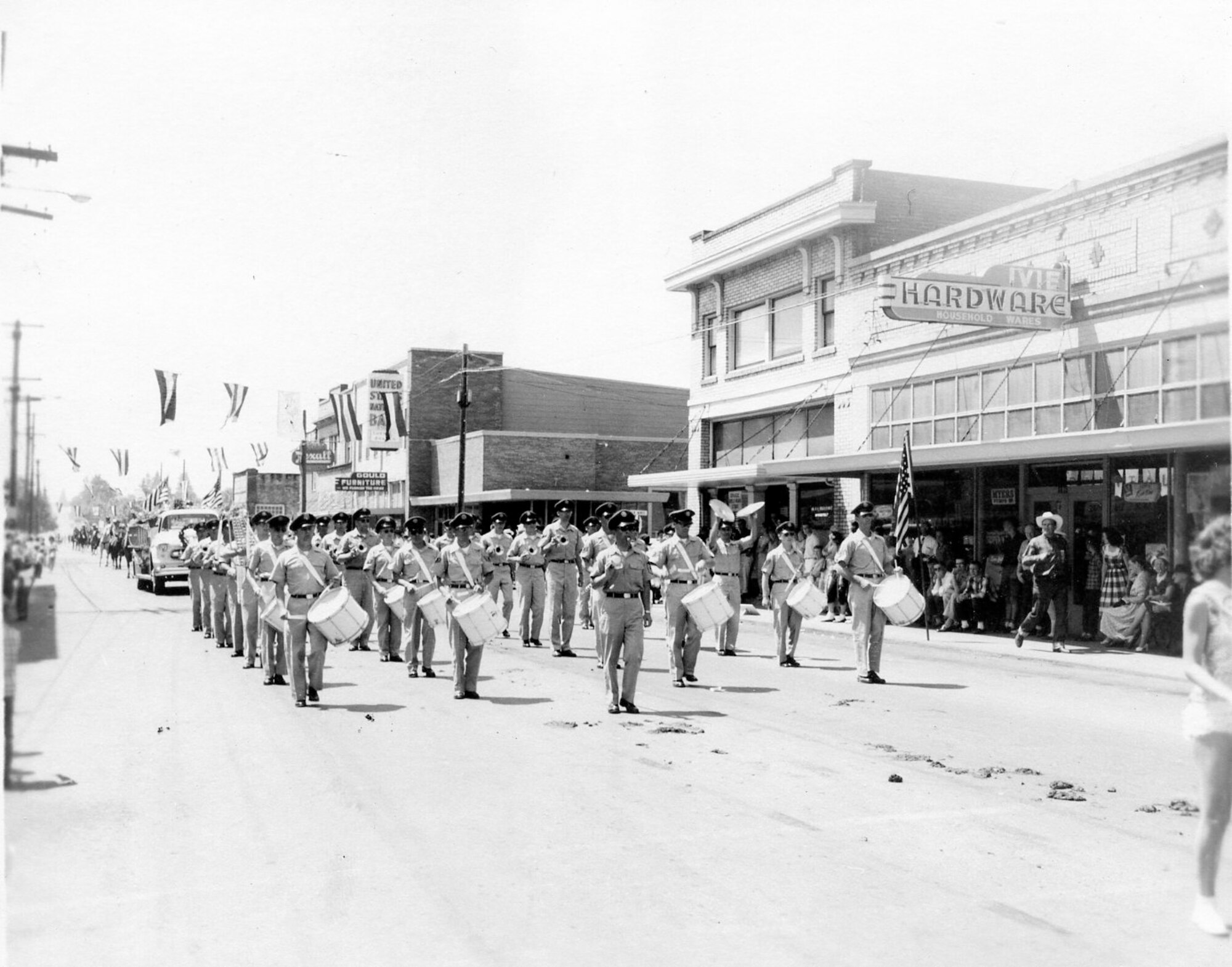 Here the OreANG Drum & Bugle Corps performs in the Phil Sheridan Days Parade on June 17, 1961 in Sheridan, Oregon. The corps won a first prize ribbon in the event.