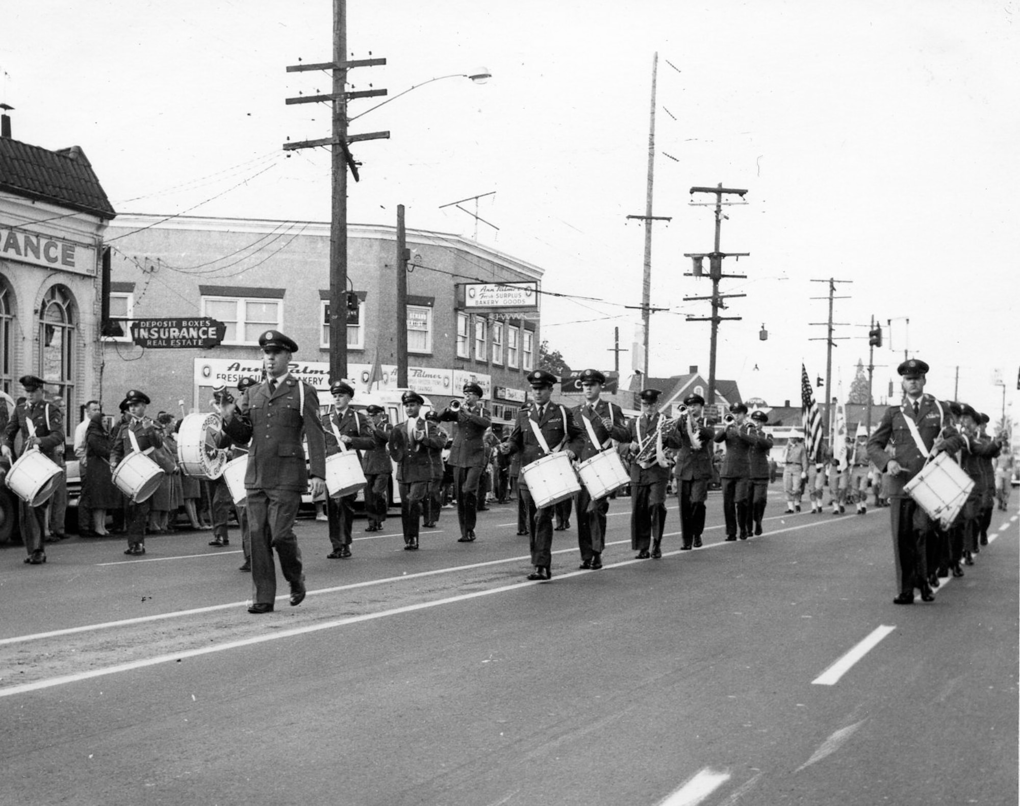 Dressed in the AF service dress blue uniforms, the OreANG Drum & Bugle Corps performs in the November, 1961, Veterans Day Parade in Portland, Oregon. The corps took first place in the Drum & Bugle Corps category in this event which took place over a two mile stretch of Southeast Portland in the Foster Road area, with an estimated 3,000 marchers involved.