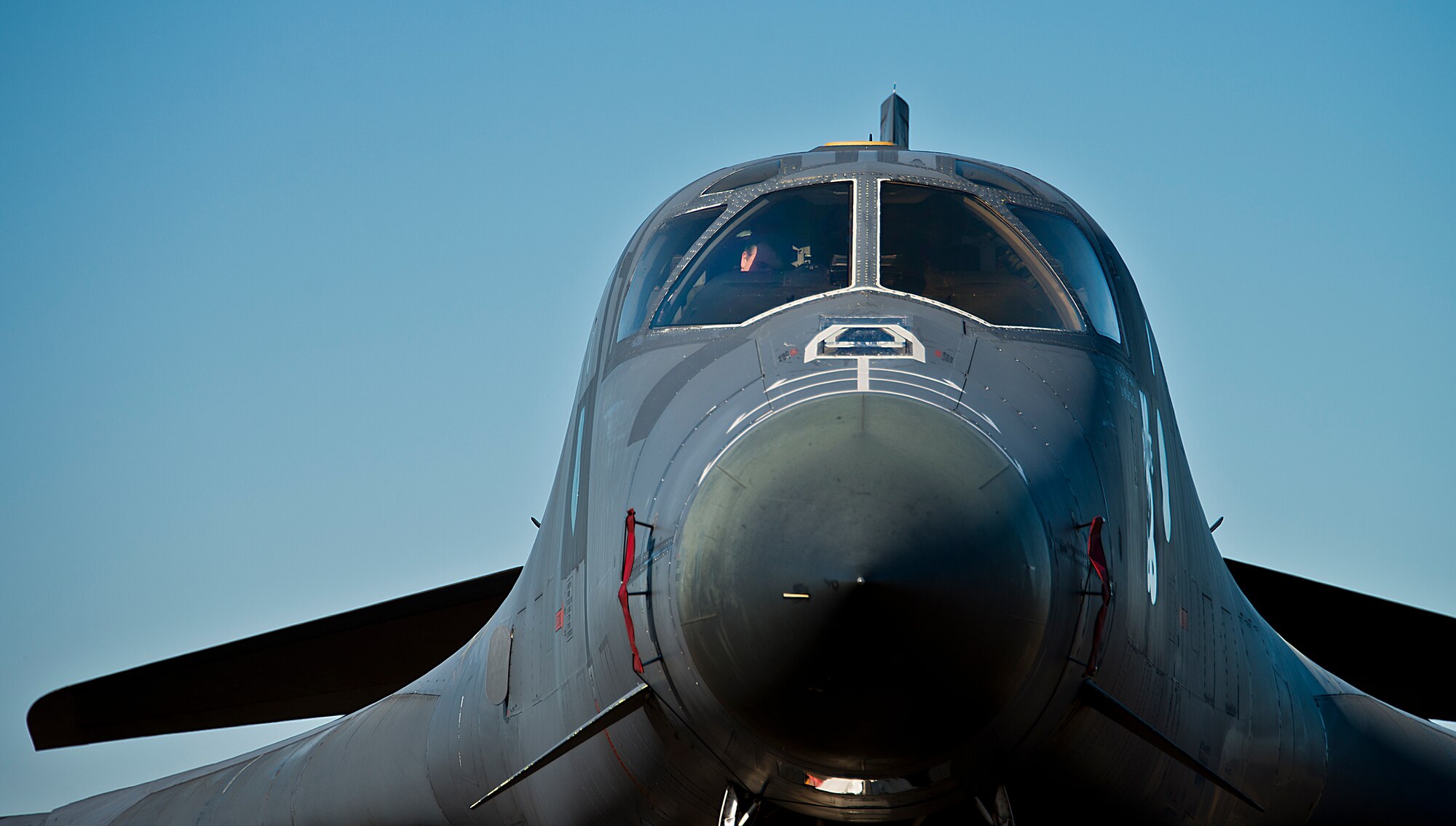 An Airman sits in the co-pilot seat of a B-1B Lancer during a tour of the aircraft Feb. 19 at Eglin Air Force Base, Fla.  The 53rd Wing bomber from Dyess AFB, Texas was here for a few missions and to allow wing personnel an opportunity to see one of their geographically separated aircraft up close.  (U.S. Air Force photo/Samuel King Jr.)

