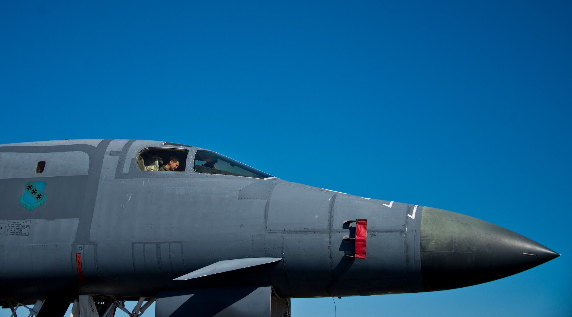 An Airman sits in the co-pilot seat of a B-1B Lancer during a tour of the aircraft Feb. 19 at Eglin Air Force Base, Fla.  The 53rd Wing bomber from Dyess AFB, Texas was here for a few missions and to allow wing personnel an opportunity to see one of their geographically separated aircraft up close.  (U.S. Air Force photo/Samuel King Jr.)