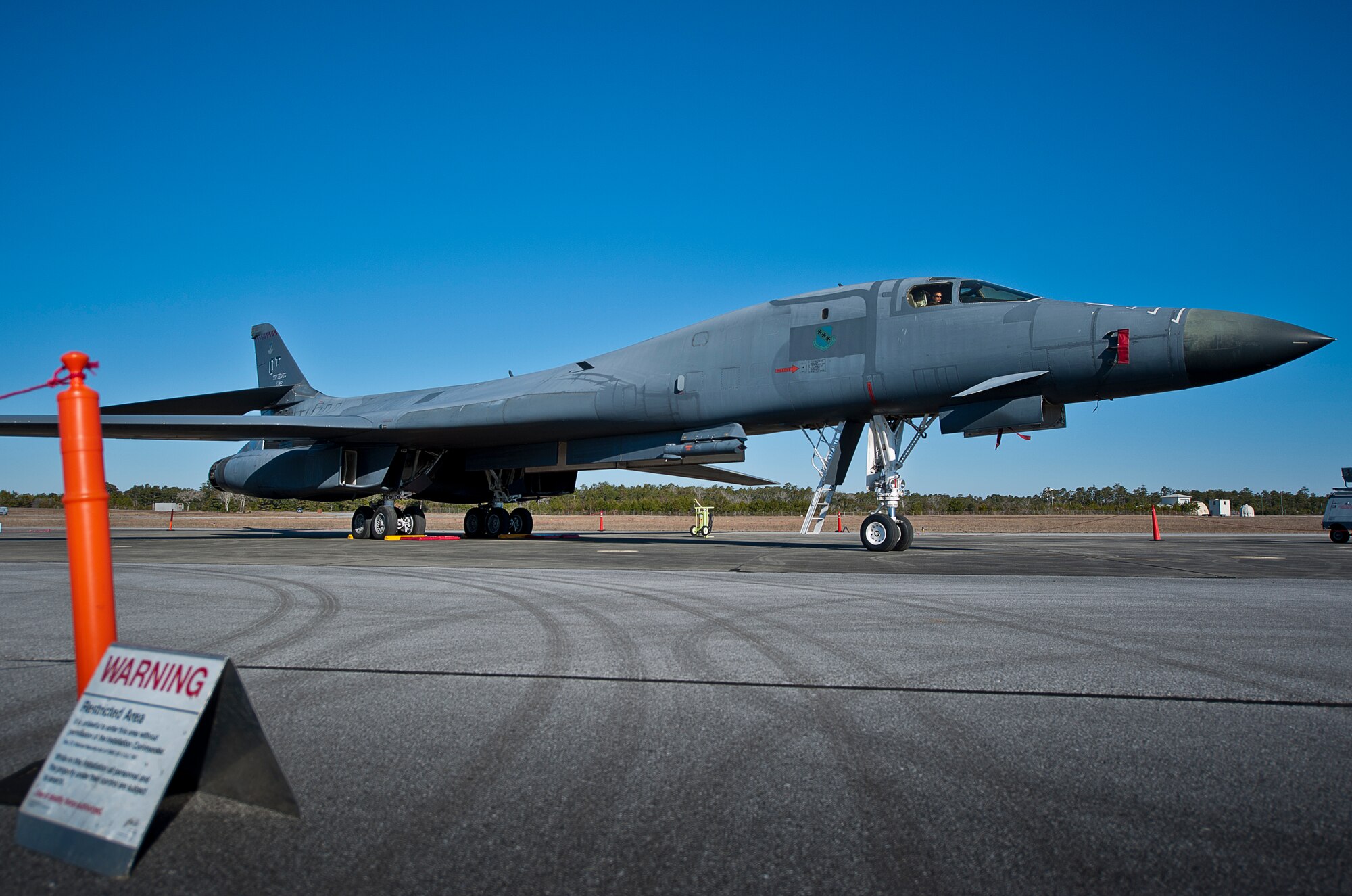 An Airman sits in the co-pilot seat of a B-1B Lancer during a tour of the aircraft Feb. 19 at Eglin Air Force Base, Fla.  The 53rd Wing bomber from Dyess AFB, Texas was here for a few missions and to allow wing personnel an opportunity to see one of their geographically separated aircraft up close.  (U.S. Air Force photo/Samuel King Jr.)