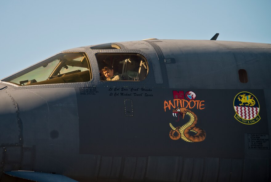 Master Sgt. Wendy Minar, 53rd Communication Systems Squadron, checks out the pilot seat of a B-1B Lancer during a tour of the aircraft Feb. 19 at Eglin Air Force Base, Fla.  The 53rd Wing bomber from Dyess AFB, Texas was here for a few missions and to allow wing personnel an opportunity to see one of their geographically separated aircraft up close.  (U.S. Air Force photo/Samuel King Jr.)