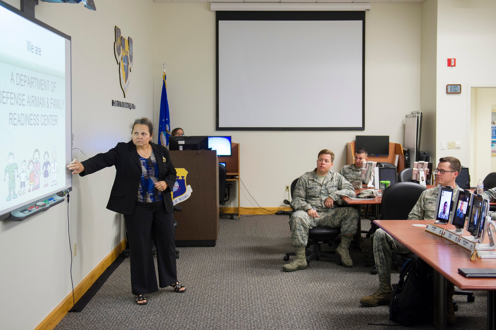 Ms. Elsa Kekahuna, community readiness consultant and Air Force aid officer for the Patrick Air Force Base Airman & Family Readiness Center, teaches during an Informed Decision Seminar Feb. 11, 2015 for the first trial of the virtual classroom. (U.S. Air Force photo/Matthew Jurgens) 