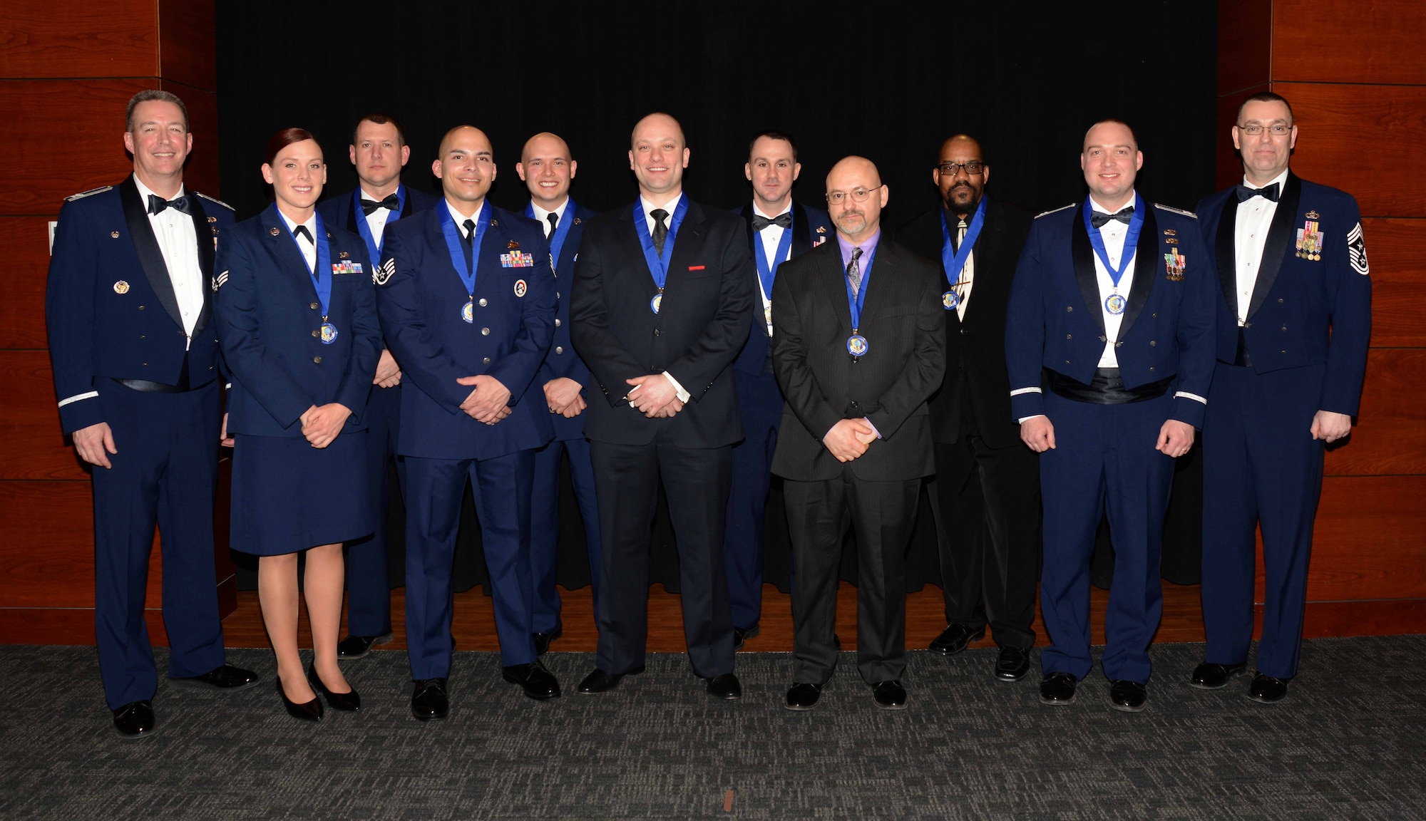 Airmen from the 673d Air Base Wing gathered to honor the 2014 Annual Award winners during a ceremony at the Arctic Warrior Events Center on Joint Base Elmendorf-Richardson Feb. 13. The awards recognized the Airmen and civilians who exemplified excellence in the year of 2014. (U.S. Air Force Photo/Airman Christopher Morales)
