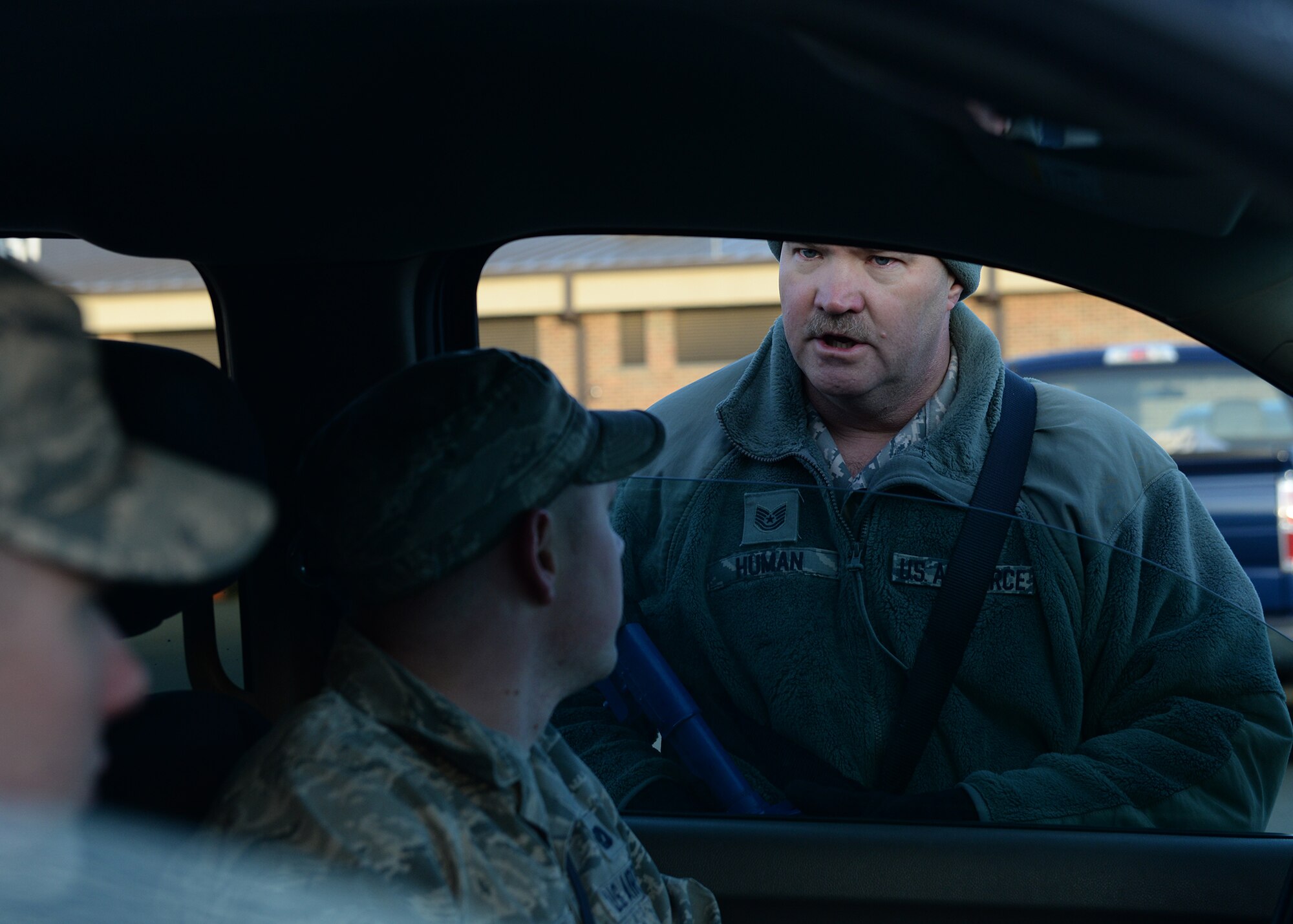 ALTUS AIR FORCE BASE, Okla. – U.S. Air Force Tech. Sgt. Tracey Human, 97th Civil Engineer Squadron expeditionary engineering and Prime Base Engineer Emergency Force manager, instructs his Airmen during a Prime BEEF exercise, Feb. 19, 2015. During the unidentified vehicle portion of the exercise, Human taught the Airmen the importance of communication amongst the three-man team to improve mission efficiency. (U.S. Air Force photo by Airman 1st Class J. Zuriel Lee/Released)