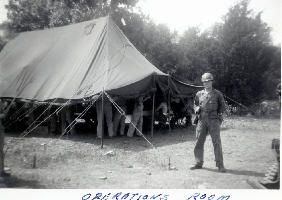 1951 Photo of Unk Individual in front of Operations Tent.  This a bivouac location at   Cedars of Lebanon State Park, Lebanon, Tennessee in June 1951 while deployed to Seward AFB, Tennessee in late 1951.  The 118th ACW Sq was further deployed to Nouasseur AB, French Morocco, North Africa on Christmas Eve 1951 in support of the Korean War effort. (Photo by NCANG Heritage Program)