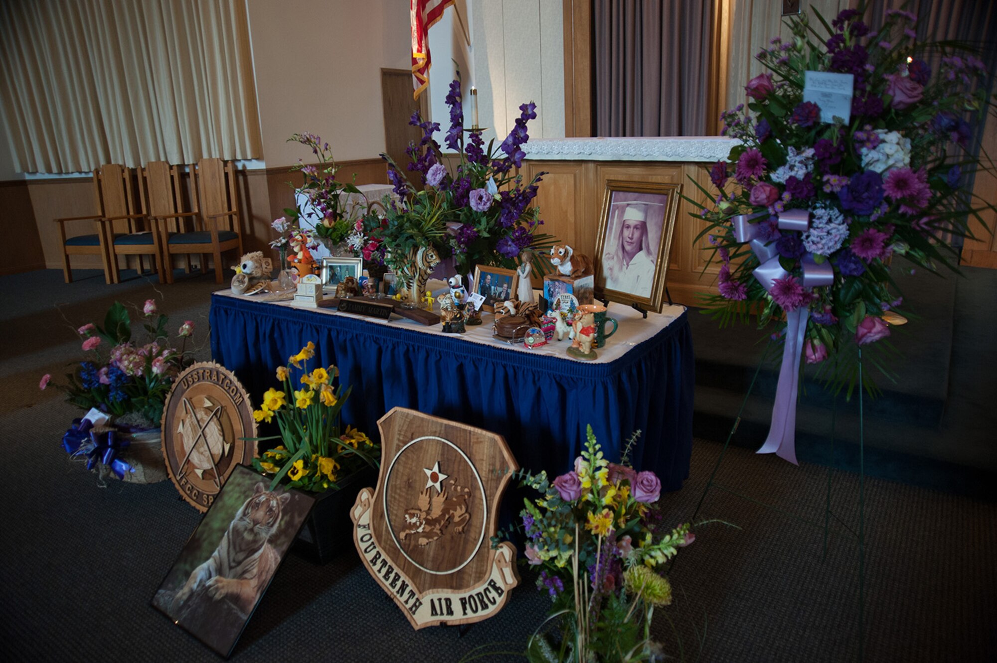 Tiger-themed mementos which adorned her desk are displayed at a memorial service for Tammy Martin, 14th Air Force Commander’s Secretary, at the base chapel, Feb. 19, 2015.  A 40-year civil servant, “Ms. Tammy,” as she was known, passed away Feb. 12, 2015 following a sudden illness. More than 200 friends, family members and members of her extended Air Force family were on hand to celebrate her life.  (U.S. Air Force photo by Michael Peterson/Released)