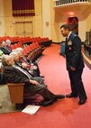 Lt. Col. Oren Leff, Air Education and Training Command Judge Advocate Chief of Civil Law and Operations Law, greets the holocaust survivors who spoke at a professional development event Feb. 11 at the Joint Base San Antonio-Randolph’s Fleenor Auditorium. The event provides insight to military members of the true impact of military service. The guest speakers are four of nine remaining holocaust survivors in the San Antonio area.   (U.S. Air Force photo by Melissa Peterson)