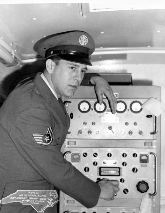 This person is believed to be SSgt Glen Trexler posing with communication equipment in van.  This photo was taken March 18th 1963 at the 263rd CBCS in Badin, NC.  (Photo by NCANG Heritage Program) Neg #B-340