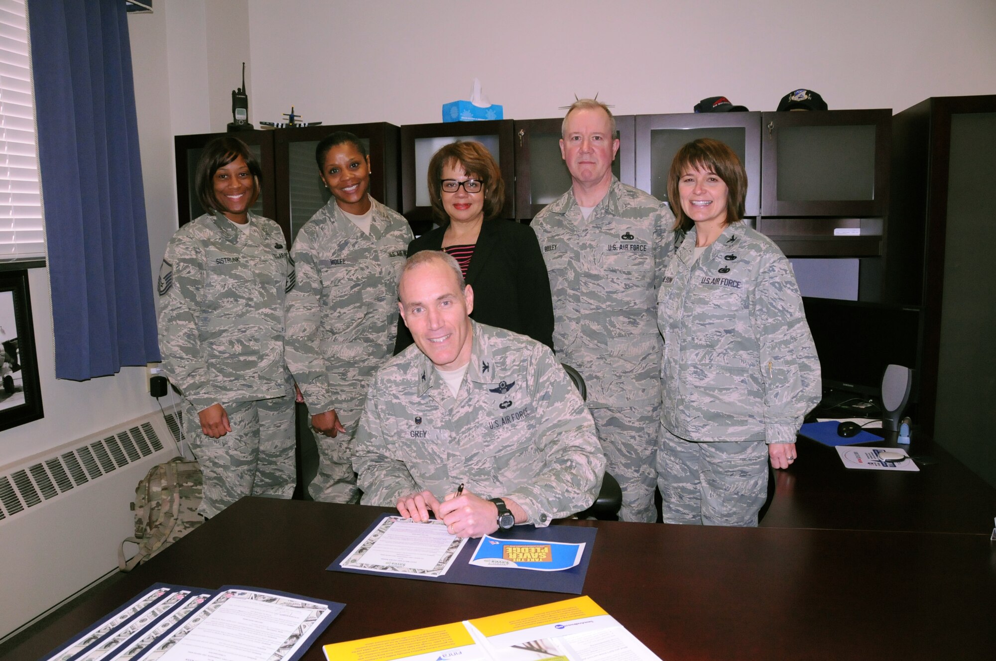 Col. Robert J. Grey, 192nd Fighter Wing commander and Fighter Wing staff members kicked off the “2015 Military Saves Week” by signing a Proclamation encouraging Airmen and family members to participate in the “Military Saves” initiative by setting goals, making a plan and increasing personal savings to improve their overall quality of life. 
As part of this initiative, the 192nd Airman and Family Readiness Programs office is partnering with local and statewide personal financial counselors to offer military families financial education classes throughout the week as well as one-on-one counseling appointments to help people build wealth, not debt. (U.S. Air National Guard photo by Tech. Sgt. Jonathan G. Garcia/Released) 


Learn more at www.militarysaves.org or contact Ms. Angeli Wade at 757-764-2388
