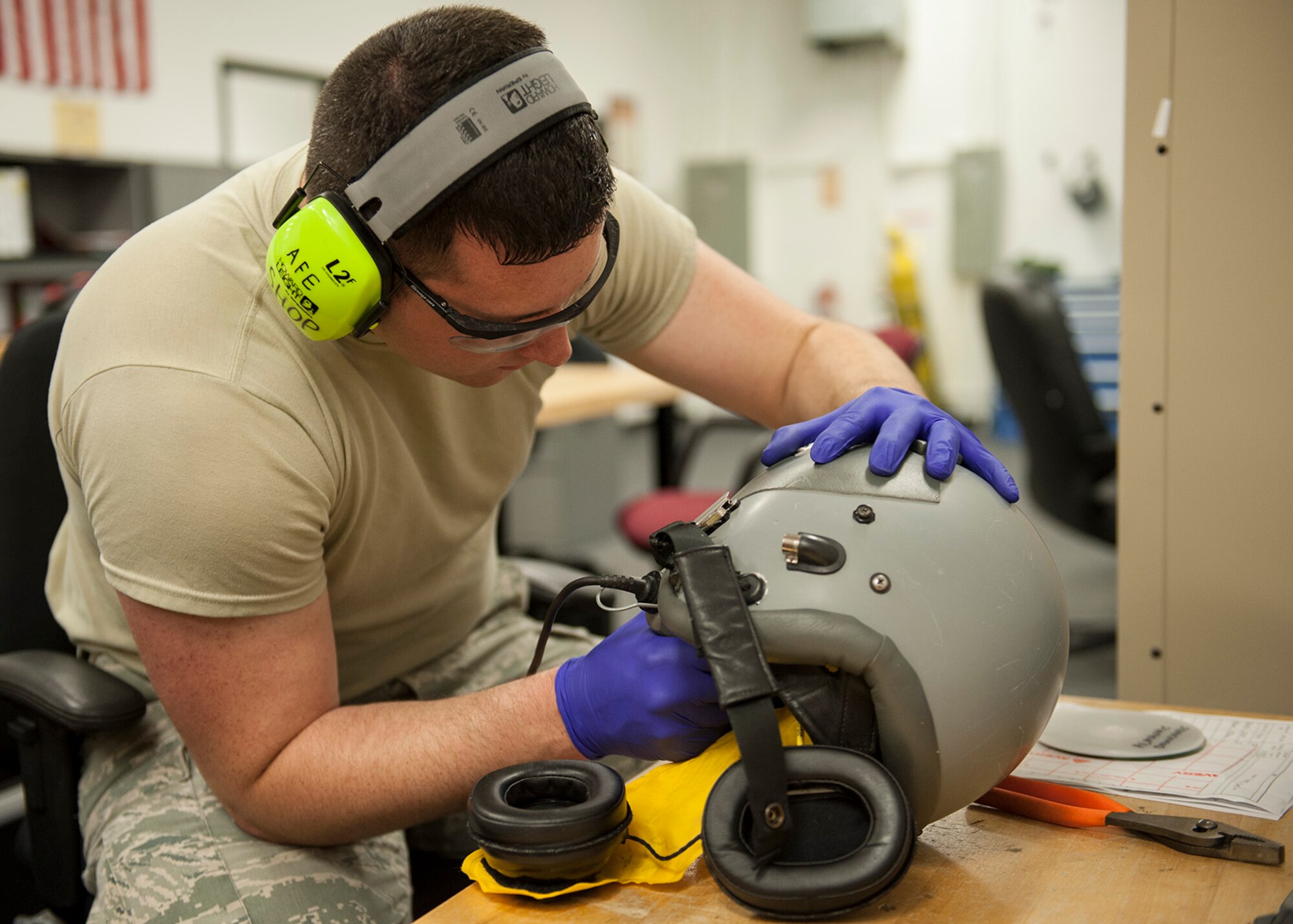 Staff Sgt. Steven Runion, of the 96th Operations Support Squadron, drills down the screws on the interior side of a fighter helmet at the Aircrew Flight Equipment facility on Eglin Air Force Base, Fla., Feb. 9. AFE technicians trim down any protruding screws to ensure no damage is done to the combat edge bladder.  The maintenance of the helmets is critical to the pilot’s performance and safety.  The bladder on the interior of the helmets is designed to improve tolerance to high-G maneuvers and help prevent G-induced loss of consciousness.  (U.S. Air Force photo/Ilka Cole)