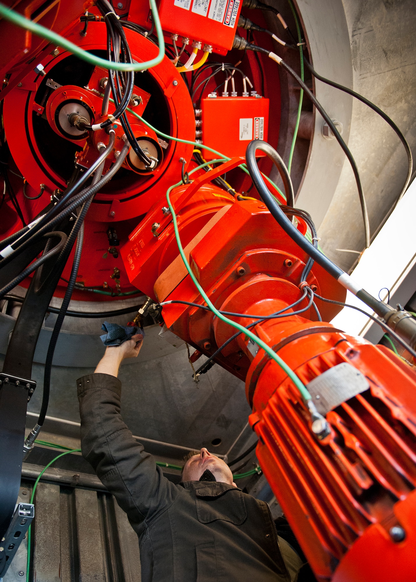 Robert Shepherd, 96th Operations Support Squadron, turns a lever on the Eglin Air Force Base radar’s engine during routine maintenance at the base’s radar facility.  The civilians in the 96th OSS’s Airfield Systems Maintenance Flight are responsible for all of the maintenance and repair of the tower and radar approach control’s electronic equipment as well as the radar itself. (U.S. Air Force photo/Samuel King Jr.)
