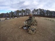 Marine 2nd Lt. Daryl J. Scales sits on the range awaiting live-fire training exercises at The Basic School, Marine Corps Base Quantico, Va. Scales is a University of Missouri graduate who volunteers at various foundations because he enjoys helping the local community.